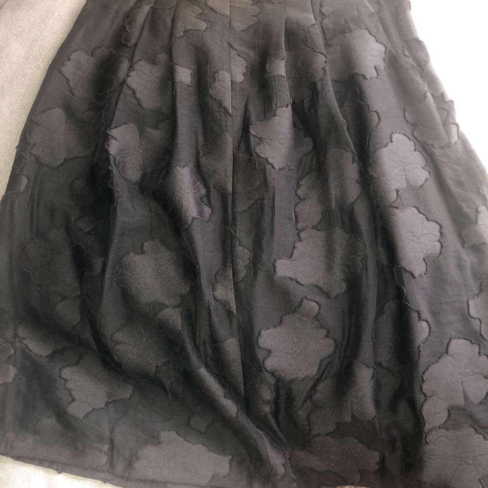 Black pleaded skirt